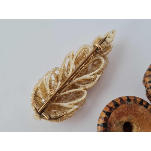 643 - A antique seed pearl brooch and treen pin cushion