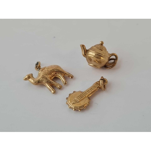 72 - Three 9ct gold charms 2.4g