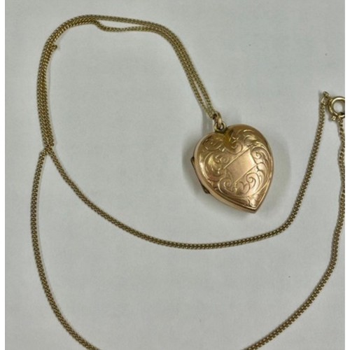 196 - Vintage 9ct gold back and front locket on yellow metal chain