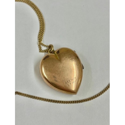 196 - Vintage 9ct gold back and front locket on yellow metal chain