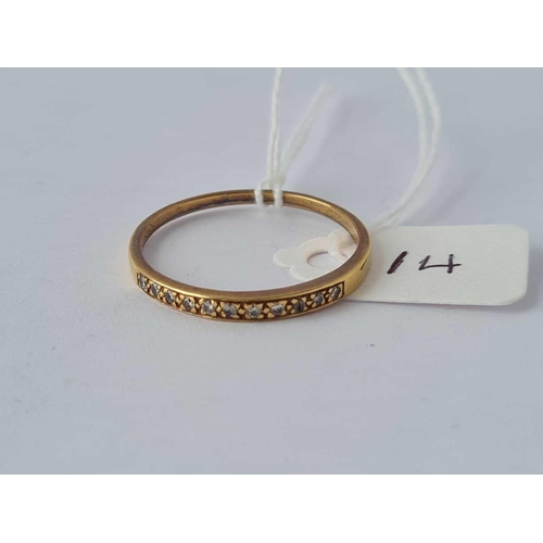 14 - A gold half eternity ring set with diamonds 18ct gold size W ½  2.4 gms