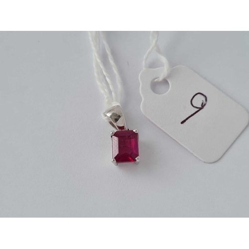 9 - A ruby pendant 18ct gold  1.1 gms
