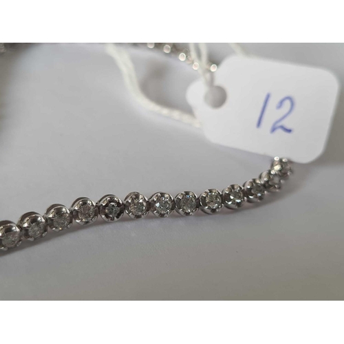 12 - A CONTEMPORARY DIAMOND BRACELET 10CT GOLD