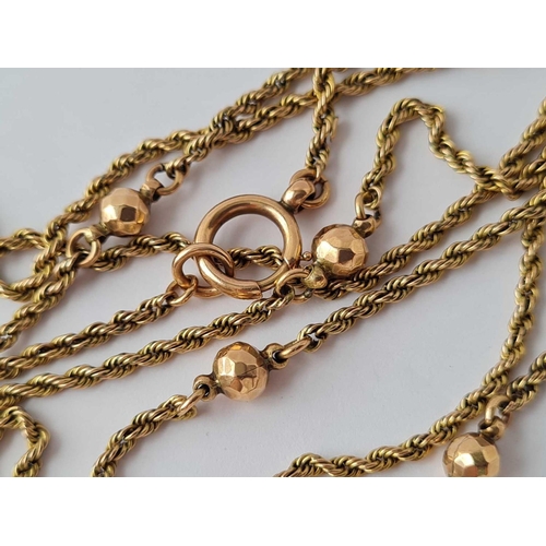 186 - A ROPE AND BALL DECORATIVE NECK CHAIN 9CT 50 INCH � 21.7 GMS