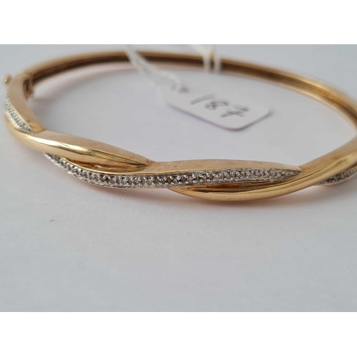 187 - A DIAMOND SET BANGLE 9CT � 14.6 GMS