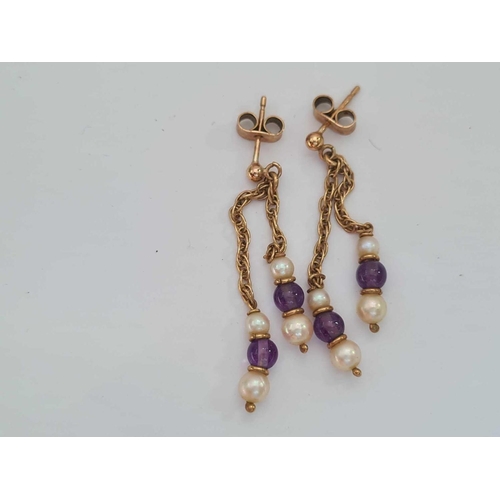 213 - A rose quartz and amethyst necklace with 9ct mounts and earrings