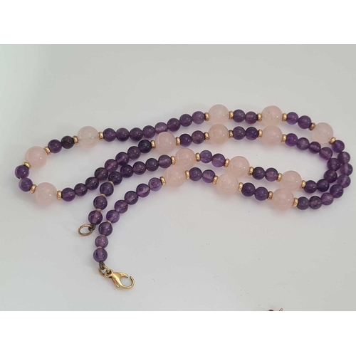 213 - A rose quartz and amethyst necklace with 9ct mounts and earrings