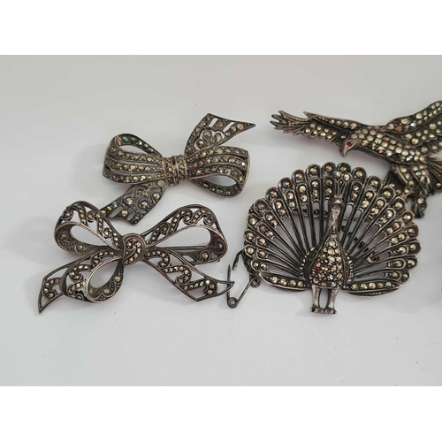 217 - Five silver and marcasite brooches