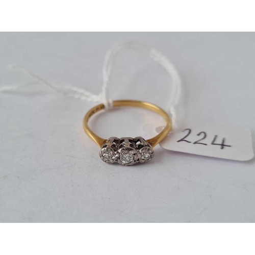 224 - A three stone diamond ring 18ct gold size O � � 2 gms