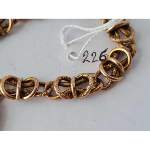 226 - A FANCY BRACELET WITH HEART PADLOCK 9CT � 14 .7 GMS