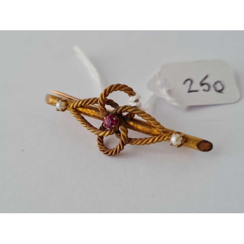 250 - Antique Edwardian 15ct marked pearl & ruby rope knot design brooch, length 43mm.