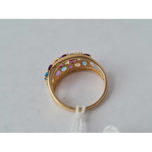 268a - A 9ct Tutti-Frutti multi gem ring set with peridot blue topaz amethyst and citrine size R � � 3.5 gm... 