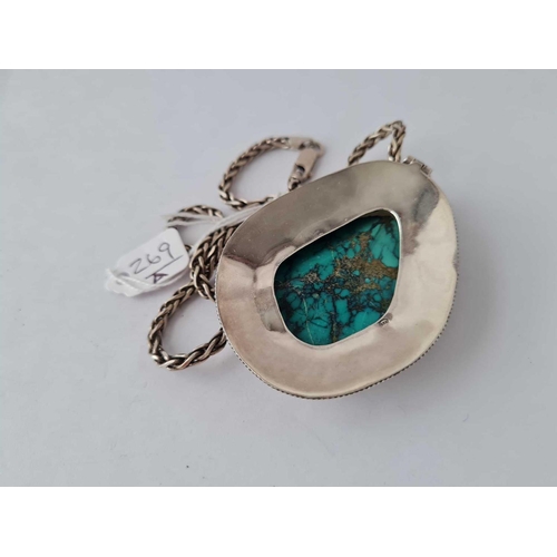 269a - A large silver turquoise pendant on chain � 76 gms