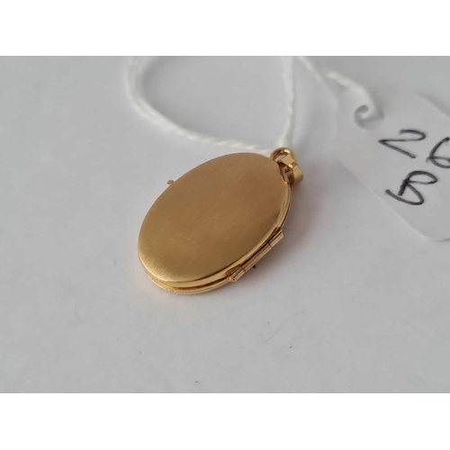 269b - A 9ct oval locket