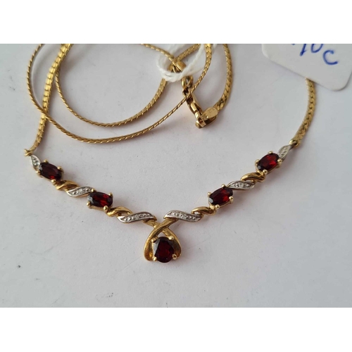 290c - A red stone and diamond necklace 9ct