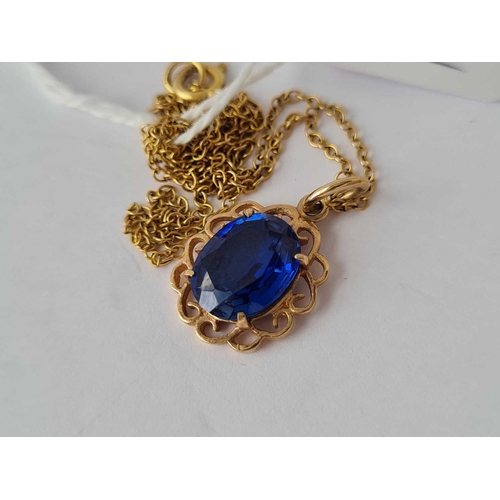 297 - 9ct blue stone pendant on 9ct chain 2.5g inc