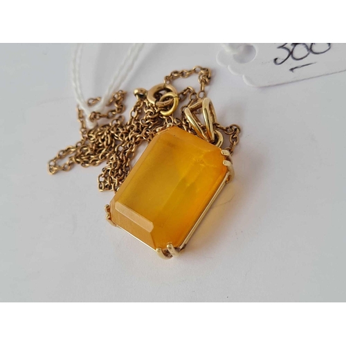 300 - A yellow stone 9ct mounted pendant on 9ct chain 6.5g inc