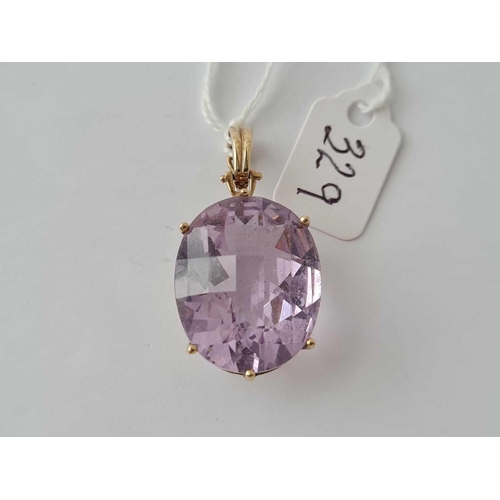 329 - A large amethyst pendant with opening bail 9ct