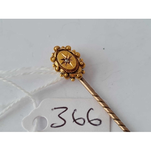 366 - A diamond set stick pin 15ct gold � 1.5 gms