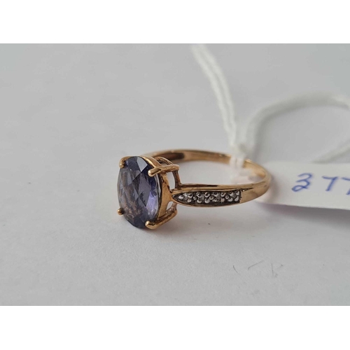 377 - A large blue  stone ring with diamond shoulders 9ct size O � 1.8 gms