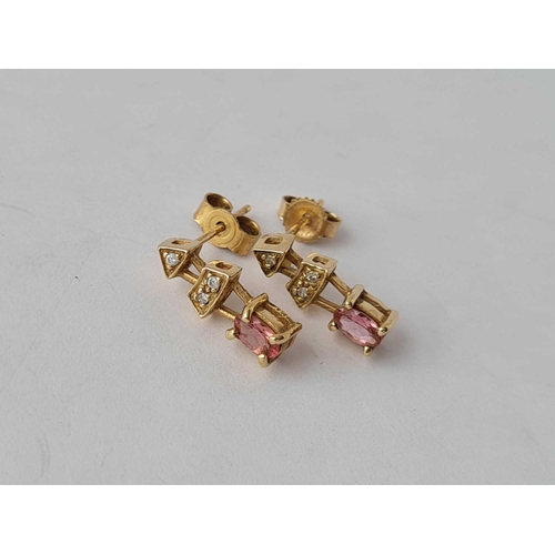 404 - A pair of pink sapphire & diamond drop earrings in 9ct