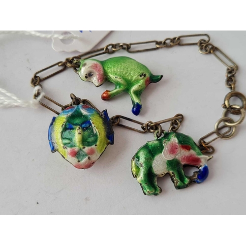 406 - A silver and enamel charm bracelets with fish/monkey and elephant charms