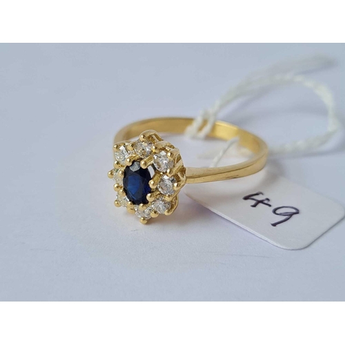 49 - GOOD QUALITY SAPPHIRE & DIAMOND OVAL CLUSTER RING, IN 18CT GOLD, TOTAL DIAMOND CONTENT 0.70 CTS, SIZ... 