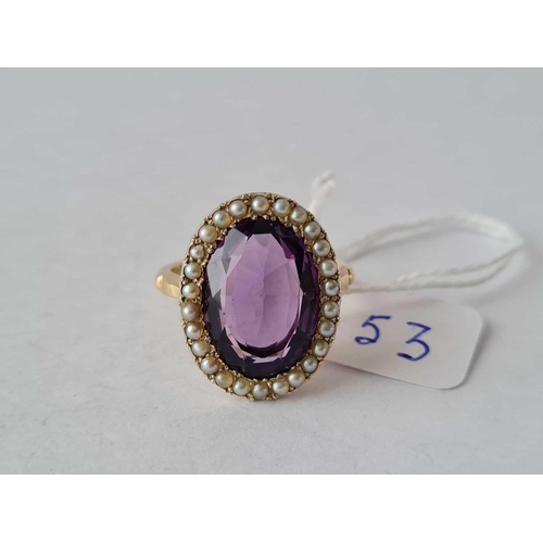 53 - A LARGE EDWARDIAN AMETHYST AND PEARL RING 9CT SIZE T � 6.8 GMS