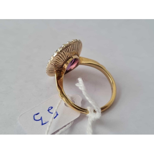 53 - A LARGE EDWARDIAN AMETHYST AND PEARL RING 9CT SIZE T � 6.8 GMS