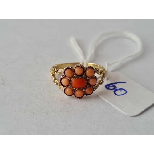 60 - A early Victorian gold and coral set cluster ring size J �