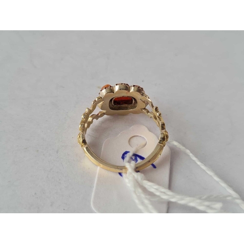 60 - A early Victorian gold and coral set cluster ring size J �