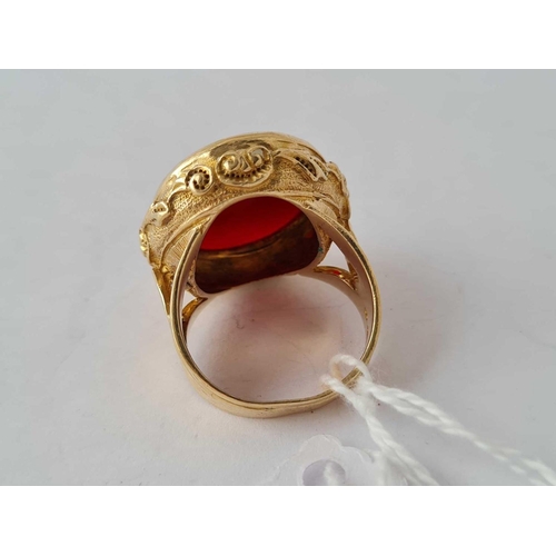 79 - A large oval carnelian 9ct fancy ring size P 11.9g inc