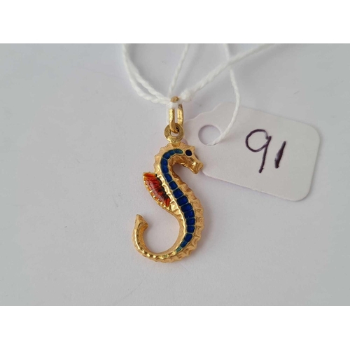 91 - A gold and enamelled sea horse pendant 18ct gold � 2 gms