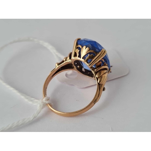 94 - A blue stone dress ring 14ct gold size J �