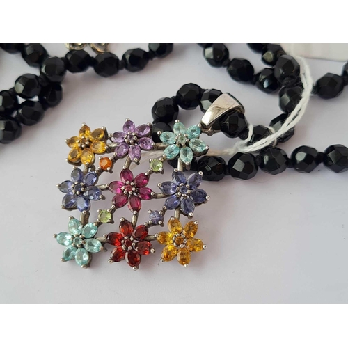 106 - A attractive silver multi gem pendant on black bead necklace