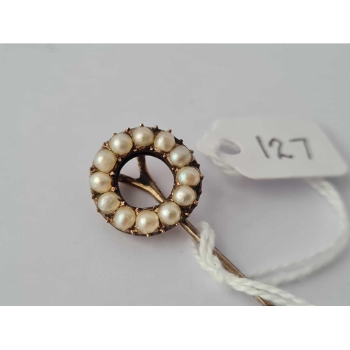 127 - A late Georgian real pearl circular high carat stick pin