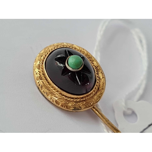 129 - Early Victorian. Carved carbuncle garnet stick pin with turquoise inlay set with high carat foliate ... 