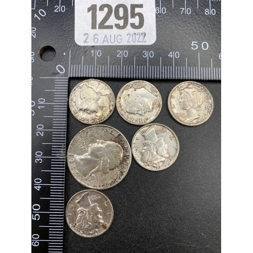 1295 - Better grade American silver coins 18 g.