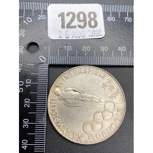 1298 - 1968 Olympics silver coin 24 g.