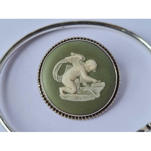 131 - A silver Wedgwood brooch together with a silver bangle