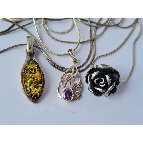 132 - Three silver pendant necklaces