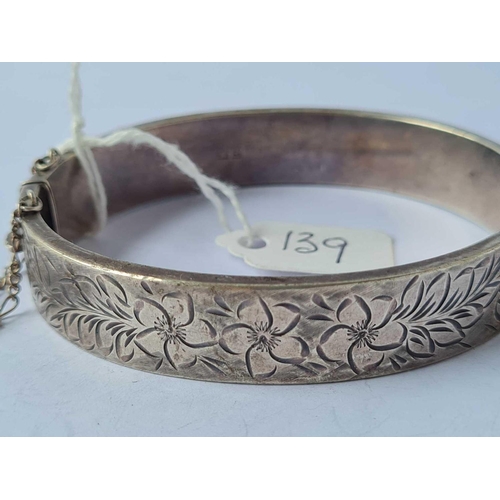 139 - A engraved silver bangle  19 gms