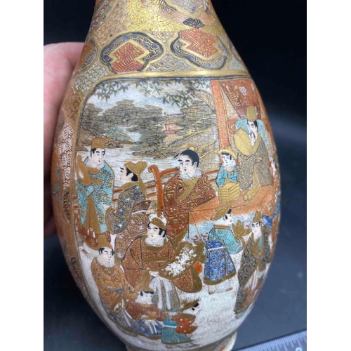 1743 - A good quality Satsuma vase decorated with numerous figures, 10” high