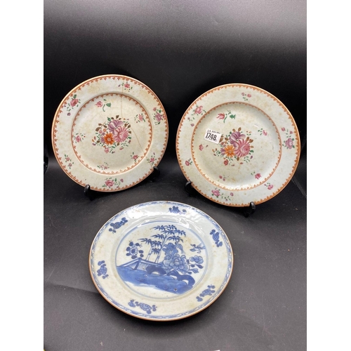 1748 - A pair of Chinese famille rose plates with flower sprays, 9” diameter and a Nankin plate