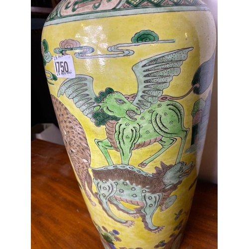 1750 - A good large Chinese vase decorated with stylised lions on a yellow ground, 22.5” high