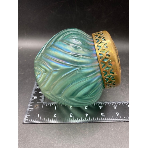 1757 - An Art Nouveau green glass flower holder with brass grill, 4.5” high