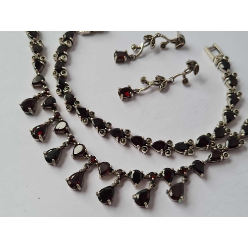 19 - A silver garnet and marcasite jewellery set