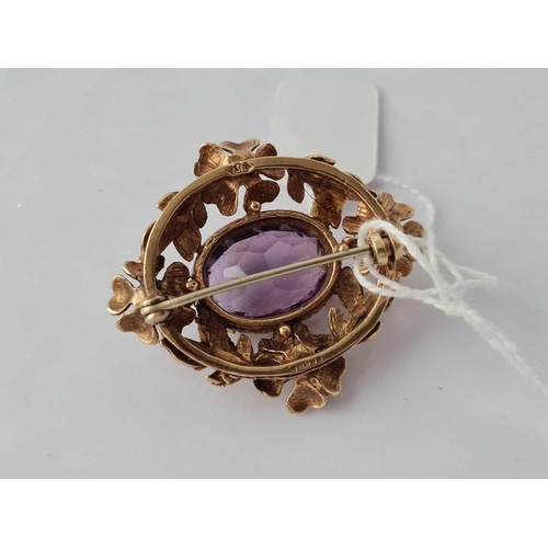 226 - A pearl and amethyst brooch 9ct  13.2 gms