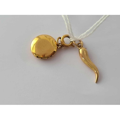 43 - A Cornucopia 14ct gold charm and a metal locket