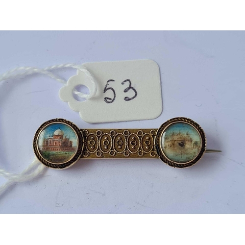 53 - A Victorian 15ct gold brooch in set two x hand painted miniatures of Indian palaces  3.7 gms